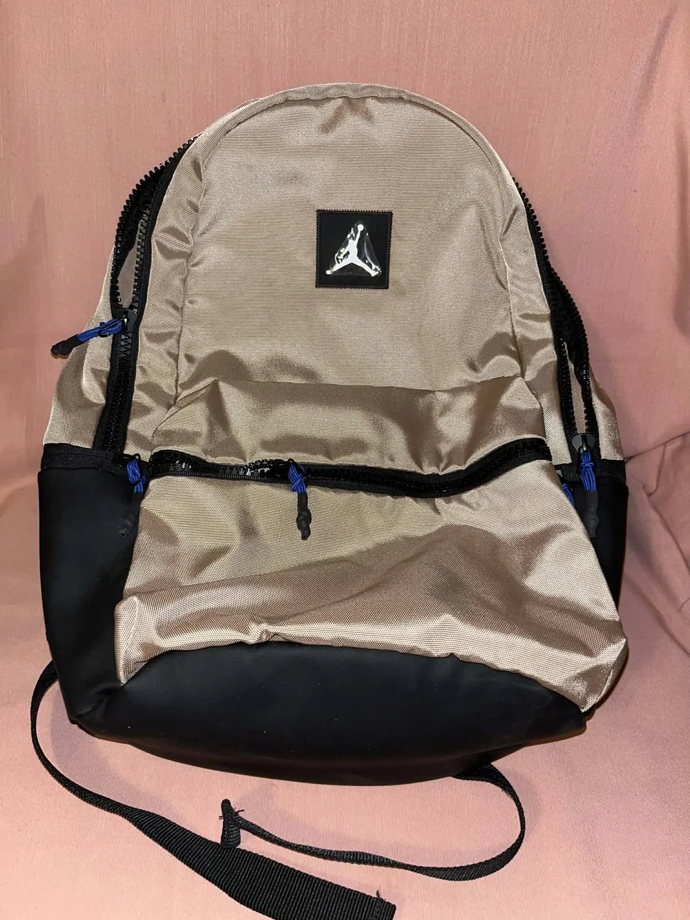 Jordan Two-Tone Tan and Black Backpack with Blue Accents